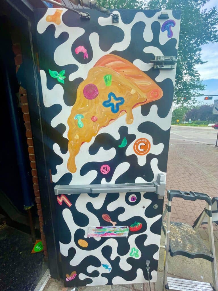 ratchet gold kaleigh gold community taps + pizza door mural